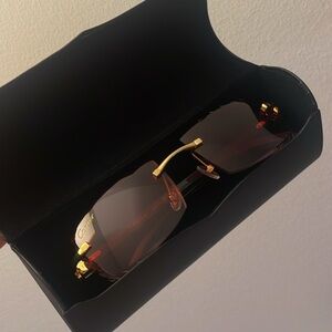 Cartier Red and Gold Rimless Eyewear